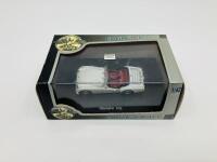 Triumph: A 1:43 scale model by Eagle's Race of the TR2, in original packaging [Location: Sydney] - 2