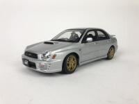 SUBARU: Three 1:18 scale Subaru Impreza's models produced by AutoArt (NB description) - 3