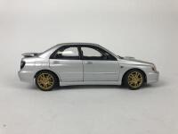 SUBARU: Three 1:18 scale Subaru Impreza's models produced by AutoArt (NB description) - 5
