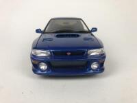 SUBARU: Three 1:18 scale Subaru Impreza's models produced by AutoArt (NB description) - 12