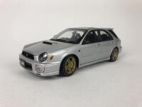 SUBARU: Three 1:18 scale Subaru Impreza's models produced by AutoArt (NB description) - 18