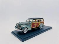 PACKARD: A 1:43 scale model by Neo Scale Models of the Packard 110 Deluxe Wagon in green, complete with original packaging [Location: Sydney] - 2