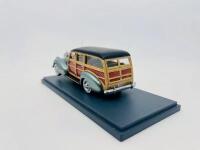 PACKARD: A 1:43 scale model by Neo Scale Models of the Packard 110 Deluxe Wagon in green, complete with original packaging [Location: Sydney] - 3