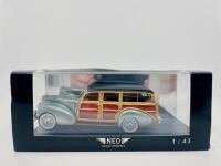 PACKARD: A 1:43 scale model by Neo Scale Models of the Packard 110 Deluxe Wagon in green, complete with original packaging [Location: Sydney] - 8