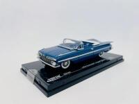 CHEVROLET: A 1:43 scale model by Vitesse of the 1959 Chevrolet Impala Convertible in Harbor Blue, complete with original packaging [Location: Sydney] - 2