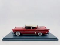 CHEVROLET: A 1:43 scale model by Neo Scale Models of the Chevrolet Bel Air HT Coupe in two-tone red and white, complete with original packaging [Location: Sydney]