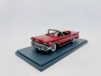 CHEVROLET: A 1:43 scale model by Neo Scale Models of the Chevrolet Bel Air HT Coupe in two-tone red and white, complete with original packaging [Location: Sydney] - 2