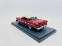 CHEVROLET: A 1:43 scale model by Neo Scale Models of the Chevrolet Bel Air HT Coupe in two-tone red and white, complete with original packaging [Location: Sydney] - 3