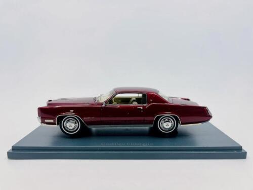 CADILLAC: A 1:43 scale model by Neo Scale Models of the Cadillac Eldorado in red, complete with original packaging [Location: Sydney]