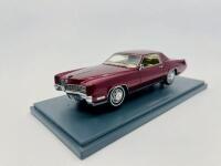 CADILLAC: A 1:43 scale model by Neo Scale Models of the Cadillac Eldorado in red, complete with original packaging [Location: Sydney] - 2