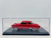 STUDEBAKER: A 1:43 scale model by Best of Show of the 1951 Studebaker Champion Starlight Coupe in red, complete with original packaging [Location: Sydney] - 7