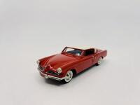 STUDEBAKER: A 1:43 scale model by Brooklin Models of the 1953 Studebaker Champion Starliner Coupe in two-tone Coral/Ivory,&nbsp;complete with original packaging [Location: Sydney] - 2