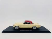 STUDEBAKER: A 1:43 scale model by Spark&nbsp;of the 1953 Studebaker Champion Coupe in two-tone ivory/red, complete with original packaging [Location: Sydney]