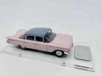 CHEVROLET: A 1:43 scale model by Trax of the 1960 Chevrolet Bel Air Sedan in two tone pink and blue. Limited edition 370/415 pieces, complete with original packaging [Location: Sydney] - 5