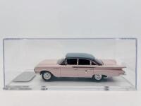 CHEVROLET: A 1:43 scale model by Trax of the 1960 Chevrolet Bel Air Sedan in two tone pink and blue. Limited edition 370/415 pieces, complete with original packaging [Location: Sydney] - 6