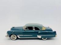 CADILLAC: A 1:43 scale model by Western Models of the 1949 Cadillac Series 62 Coupe De Ville&nbsp;in two tone blue, complete with original packaging [Location: Sydney]