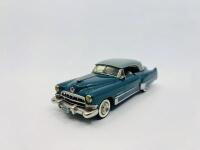 CADILLAC: A 1:43 scale model by Western Models of the 1949 Cadillac Series 62 Coupe De Ville&nbsp;in two tone blue, complete with original packaging [Location: Sydney] - 2