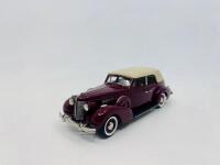 BUICK: A 1:43 scale model by Brooklin Models of the 1937 Buick Special 5-Passenger Convertible Phaeton in Sandringham Maroon, complete with original packaging [Location: Sydney] - 2