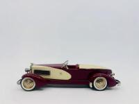 DUESENBERG: A 1:43 scale model by Precision Miniatures&nbsp;of the 1932&nbsp;Duesenberg SJ Weymann Speedster, complete with original box [Location: Sydney]