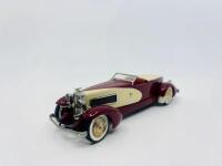 DUESENBERG: A 1:43 scale model by Precision Miniatures&nbsp;of the 1932&nbsp;Duesenberg SJ Weymann Speedster, complete with original box [Location: Sydney] - 2