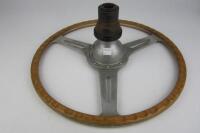 STEERING WHEEL: An aftermarket light weight wood grain steering wheel with boss - 2