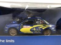 SUBARU: Unopened 1:18 scale Peter Solberg 2004 Rally Monte Carlo car and Subaru world rally team hat (NB description) - 2