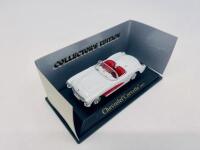 CHEVROLET: A 1:43 scale model by Road Signature of the 1957 Chevrolet Corvette convertible in white, complete with original packaging [Location: Sydney] - 2