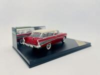 CHEVROLET: A 1:43 scale model by Vitesse of the 1957 Chevrolet Nomad in two-tone Red and Ivory, complete with original packaging [Location: Sydney] - 2