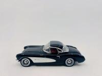 CHEVROLET: A 1:43 scale model by Road Signature of the 1957 Chevrolet Corvette convertible in white, complete with original packaging [Location: Sydney]