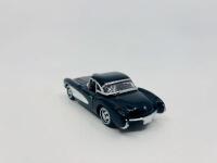 CHEVROLET: A 1:43 scale model by Road Signature of the 1957 Chevrolet Corvette convertible in white, complete with original packaging [Location: Sydney] - 3