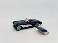 CHEVROLET: A 1:43 scale model by Road Signature of the 1957 Chevrolet Corvette convertible in white, complete with original packaging [Location: Sydney] - 4