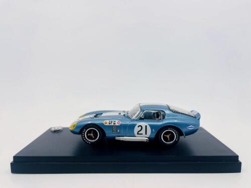 SHELBY: A 1:43 scale model by Kyosho of the Shelby Cobra Daytona Coupe, driven in the 1966 Japan Grand Prix, complete with original packaging [Location: Sydney]