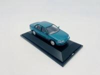 FORD: A 1:43 scale model by Paradise Garage of the Ford EF Falcon Futura in Reef Green Metallic, complete with original packaging - 5
