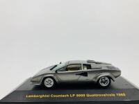 LAMBORGHINI: A 1:43 scale model by IXO of the Countach LP4000 Quattrovalvole, in original packaging [Location: Sydney]