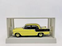 HOLDEN: A 1:43 scale model by Trax of the Holden FC in yellow/black, complete with original packaging - 2