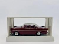HOLDEN: A 1:43 scale model by Trax of the Holden EK in red/white, complete with original packaging - 2