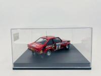 FORD: A 1:43 scale model by Trofeu of the Ford Escort Mk II, winner of the 1976 RAC Rally, driven by Roger Clark, complete with original packaging [Location: Sydney] - 5