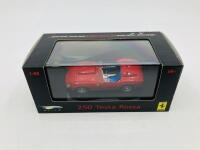 FERRARI: A 1:43 scale model by Hot Wheels of the 250 Testa Rossa, in original packaging [Location: Sydney] - 2