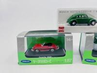 VOLKSWAGEN: Three 1:87 models, a 1972 Volkswagen Bus T2 in Polizei livery by Nex Models, a Porsche 356B by Nex models and a VW Beetle by Busch, all complete with original packaging [Location: Sydney] - 3