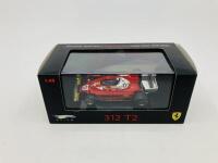 FERRARI: A 1:43 scale model by Hot Wheels of the 312 T2, in original packaging [Location: Sydney] - 2