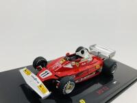 FERRARI: A 1:43 scale model by Hot Wheels of the 312 T2, in original packaging [Location: Sydney] - 4