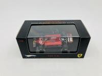 FERRARI: A 1:43 scale model by Hot Wheels of the 126 CK, in original packaging [Location: Sydney] - 2
