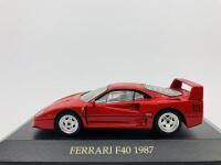 FERRARI: A 1:43 scale model by IXO of the F40, in original packaging [Location: Sydney]