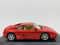 FERRARI: A 1:43 scale model by Minichamps of the F355, in original packaging [Location: Sydney]