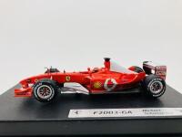 FERRARI: A 1:43 scale model by Hot Wheels of the F2003-GA, in original packaging [Location: Sydney]
