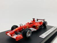 FERRARI: A 1:43 scale model by Hot Wheels of the F2003-GA, in original packaging [Location: Sydney] - 4