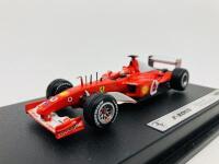 FERRARI: A 1:43 scale model by Hot Wheels of the F2002, in original packaging [Location: Sydney] - 4