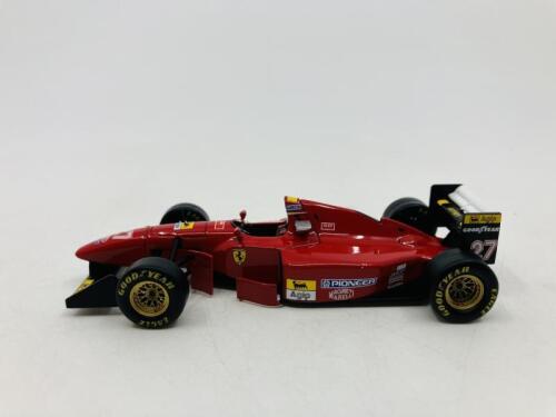 FERRARI: A 1:43 scale model by Hot Wheels of the 412 T1, in original packaging [Location: Sydney]