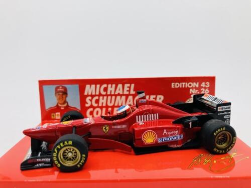 FERRARI: A 1:43 scale model by Minichamps of the F310 in Michael Schumacher livery, in original packaging [Location: Sydney]