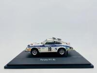 PORSCHE: A 1:43 scale model by Schuco of the Porsche 911 RS #19 "Safari Rally 1974",&nbsp;&nbsp;complete with original packaging [Location: Sydney]